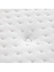 Detalle del acolchado y capitoné pasante en la tapicería del colchón Flex Natur Talalay.