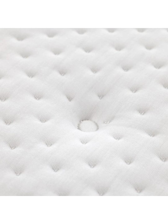 Detalle del acolchado y capitoné pasante en la tapicería del colchón Flex Natur Talalay.