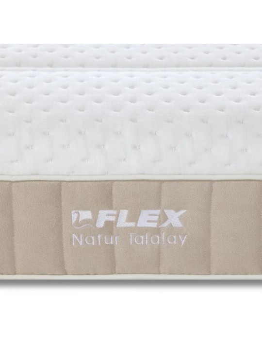 Bordado del logotipo Flex Natur Talalay en la platabanda beige del colchón.